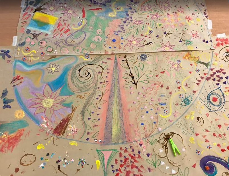 A drawing on a paper AI-generated content may be incorrect.